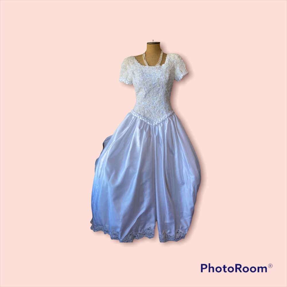 Mon Cherie Modest Bridal Gown. Beautiful Beaded Bodice with braided satin trim